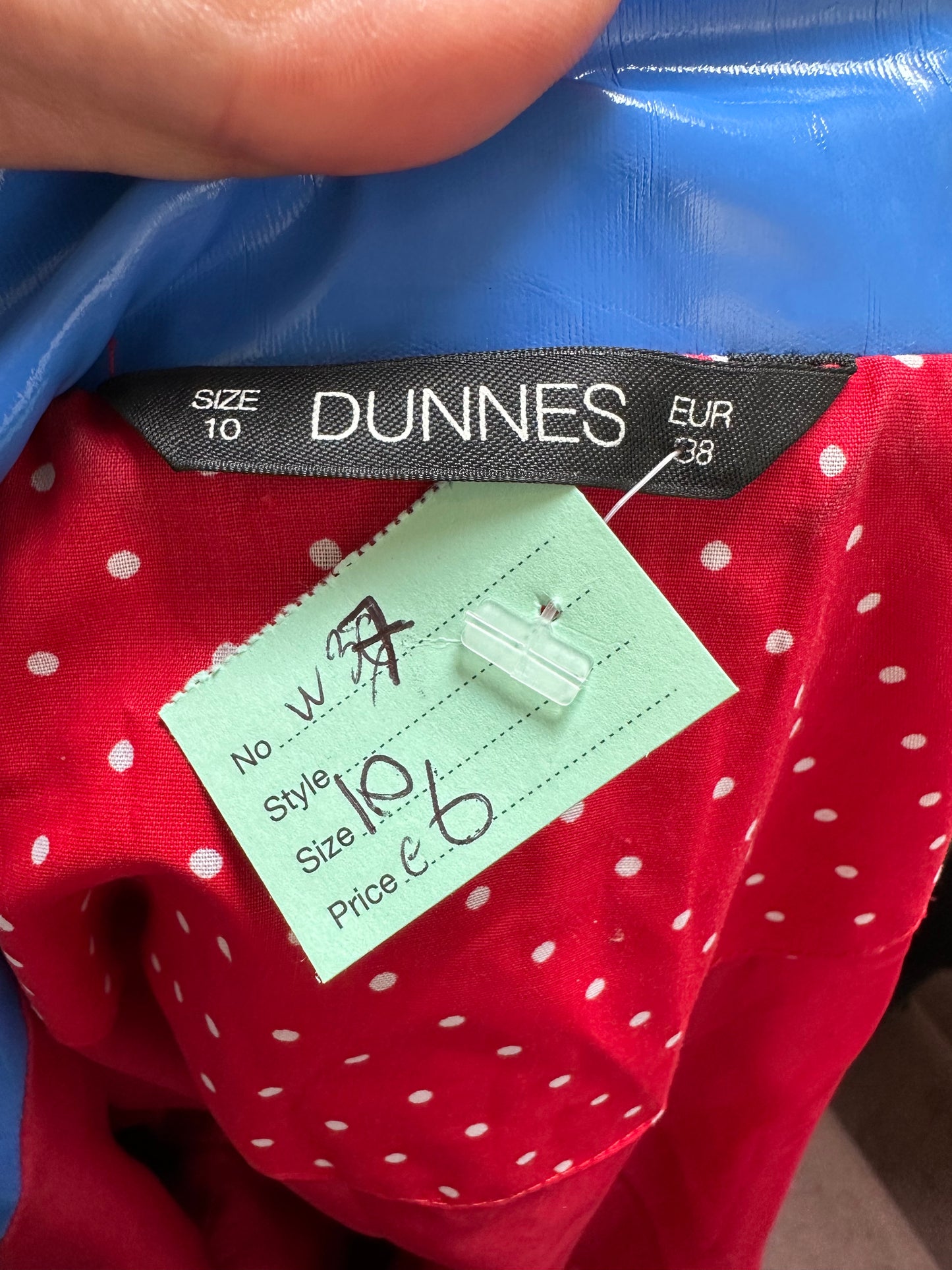 Dunnes Raincoat Size 10 Pocket needs a stitch