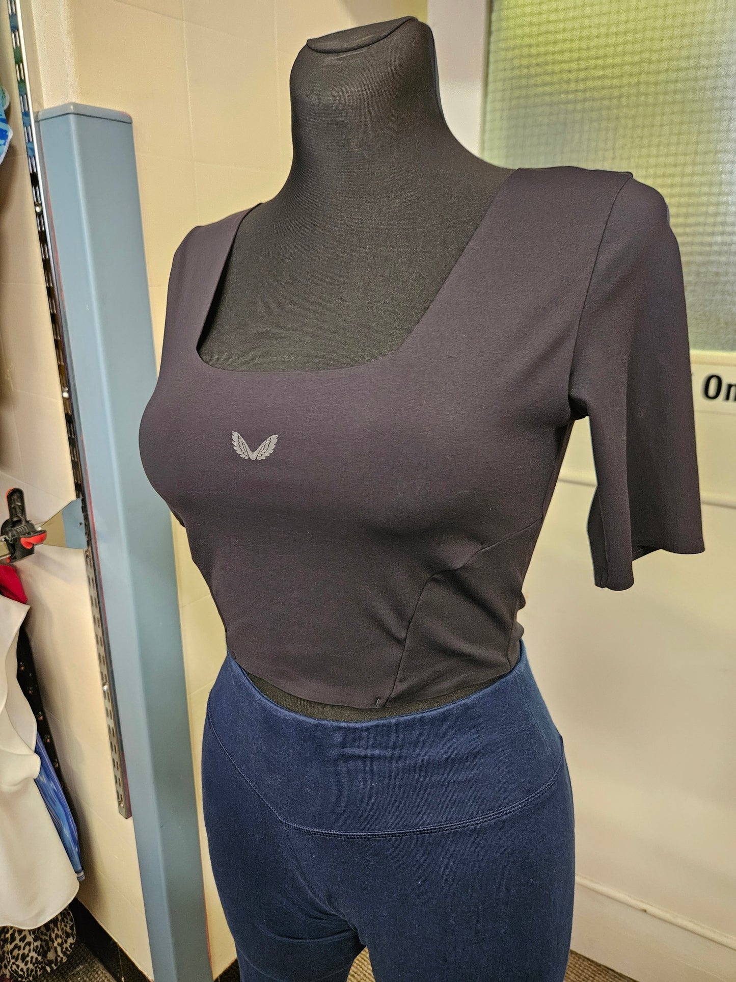 Castore, sports top size XS