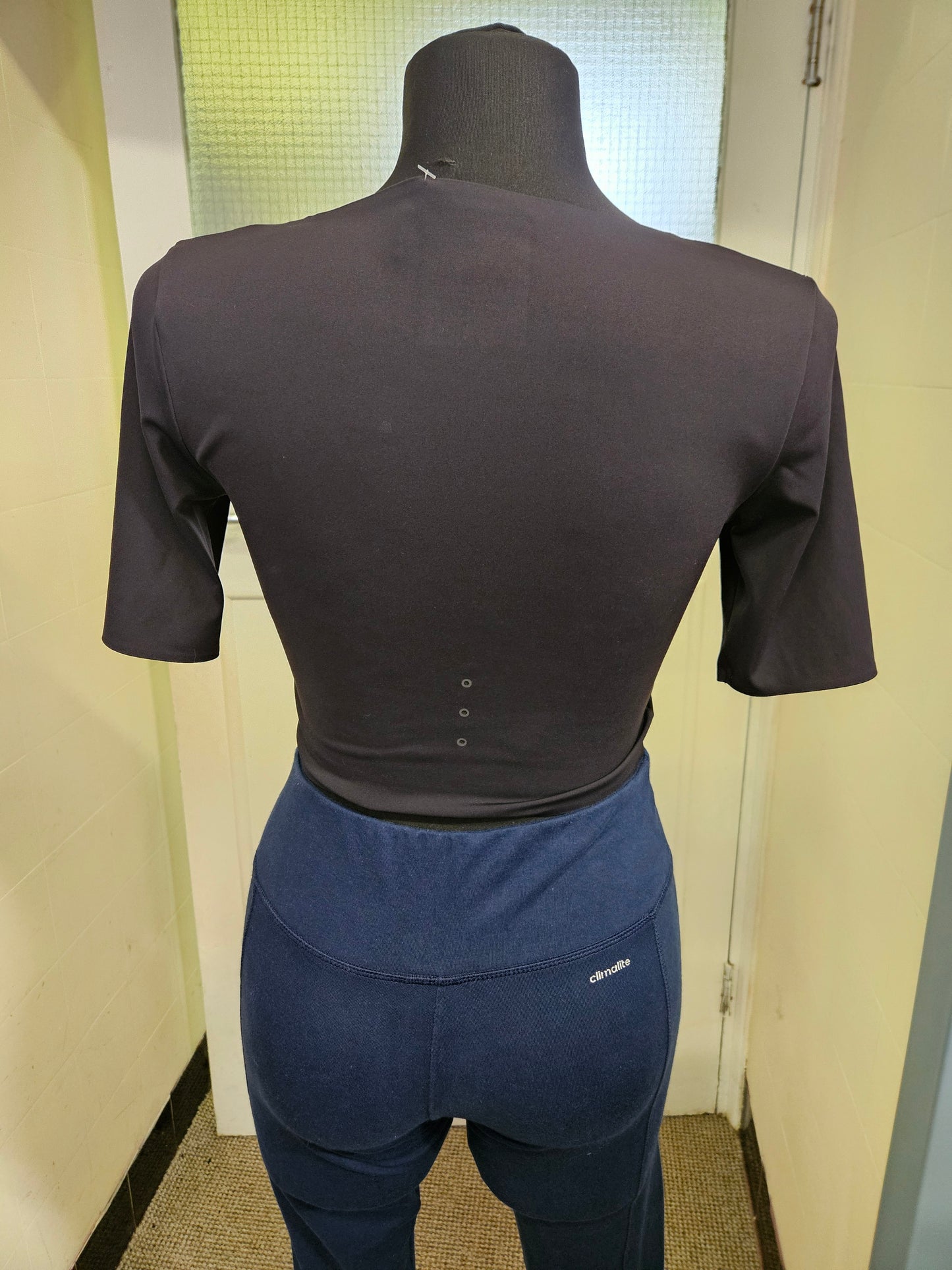 Castore, sports top size XS