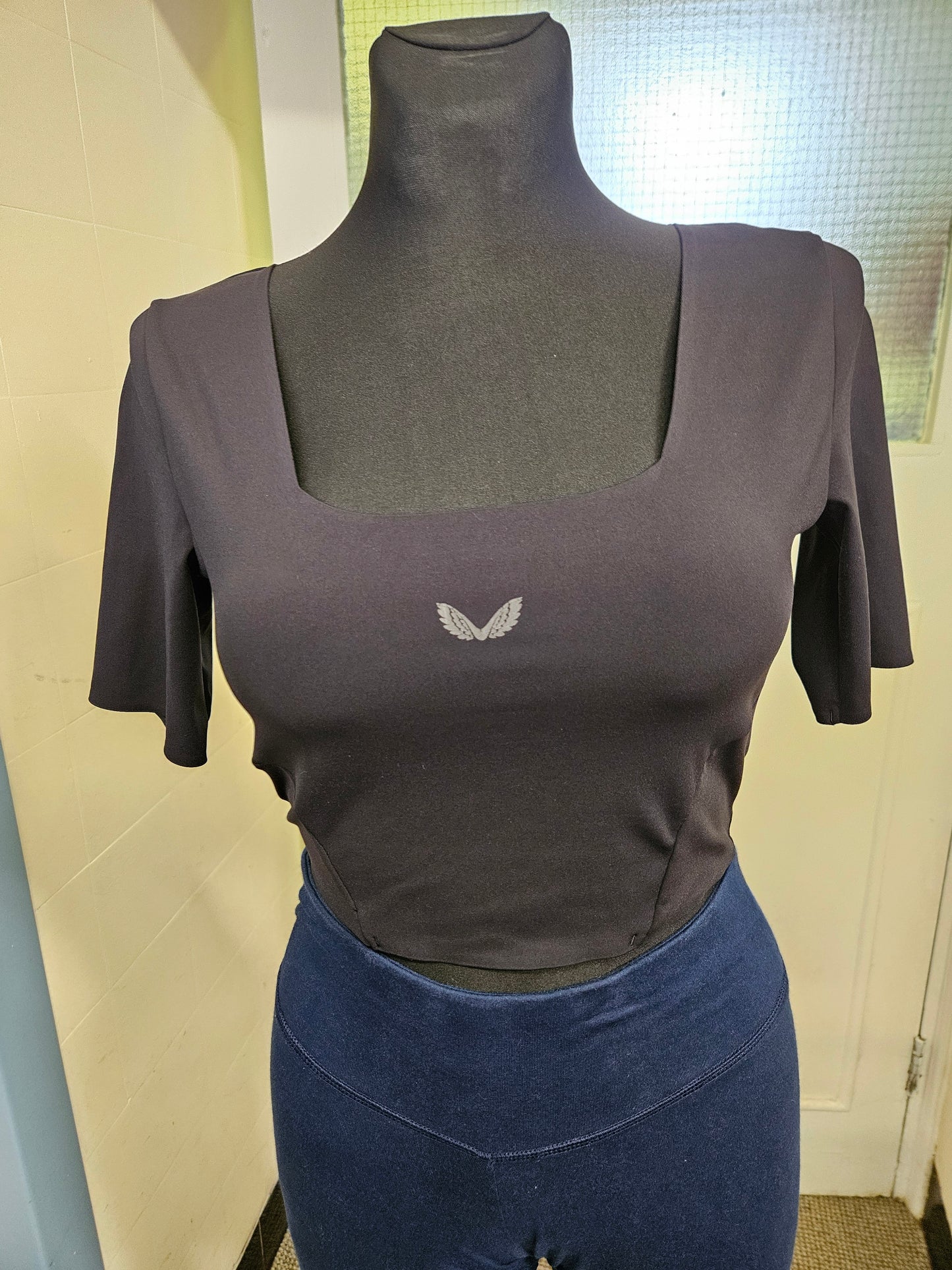 Castore, sports top size XS
