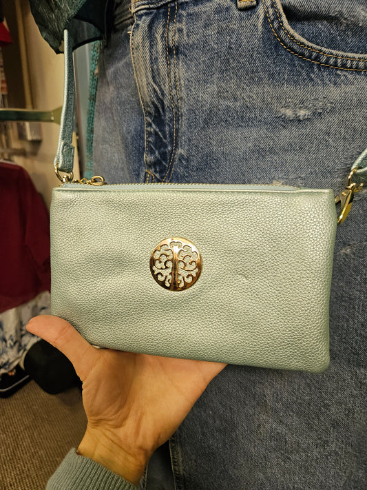 Small crossbody bag, like new, light blue