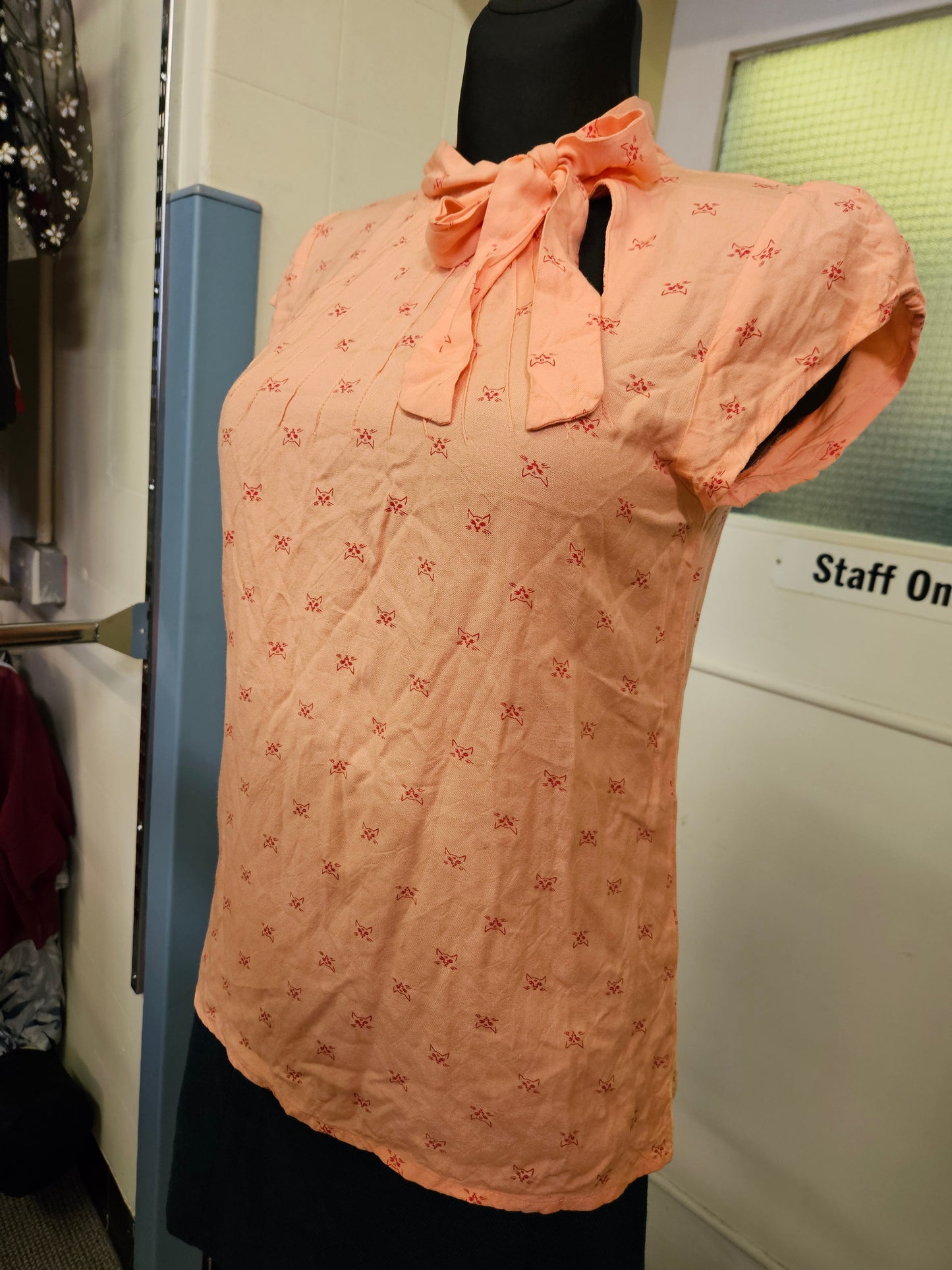 Circus, orange top with cat print, size 10