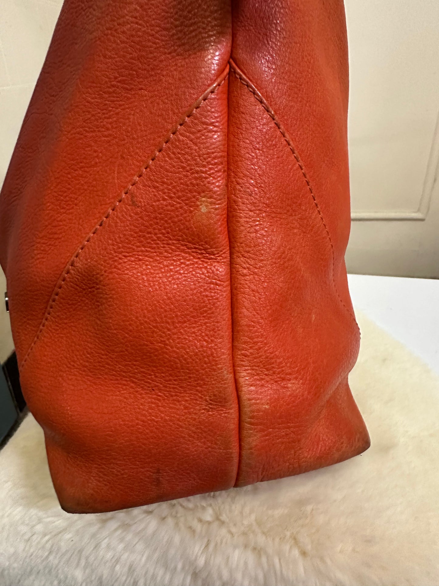 Designer Yoshi Real Leather Orange Bag Some signs or wear but will look great after a good polish