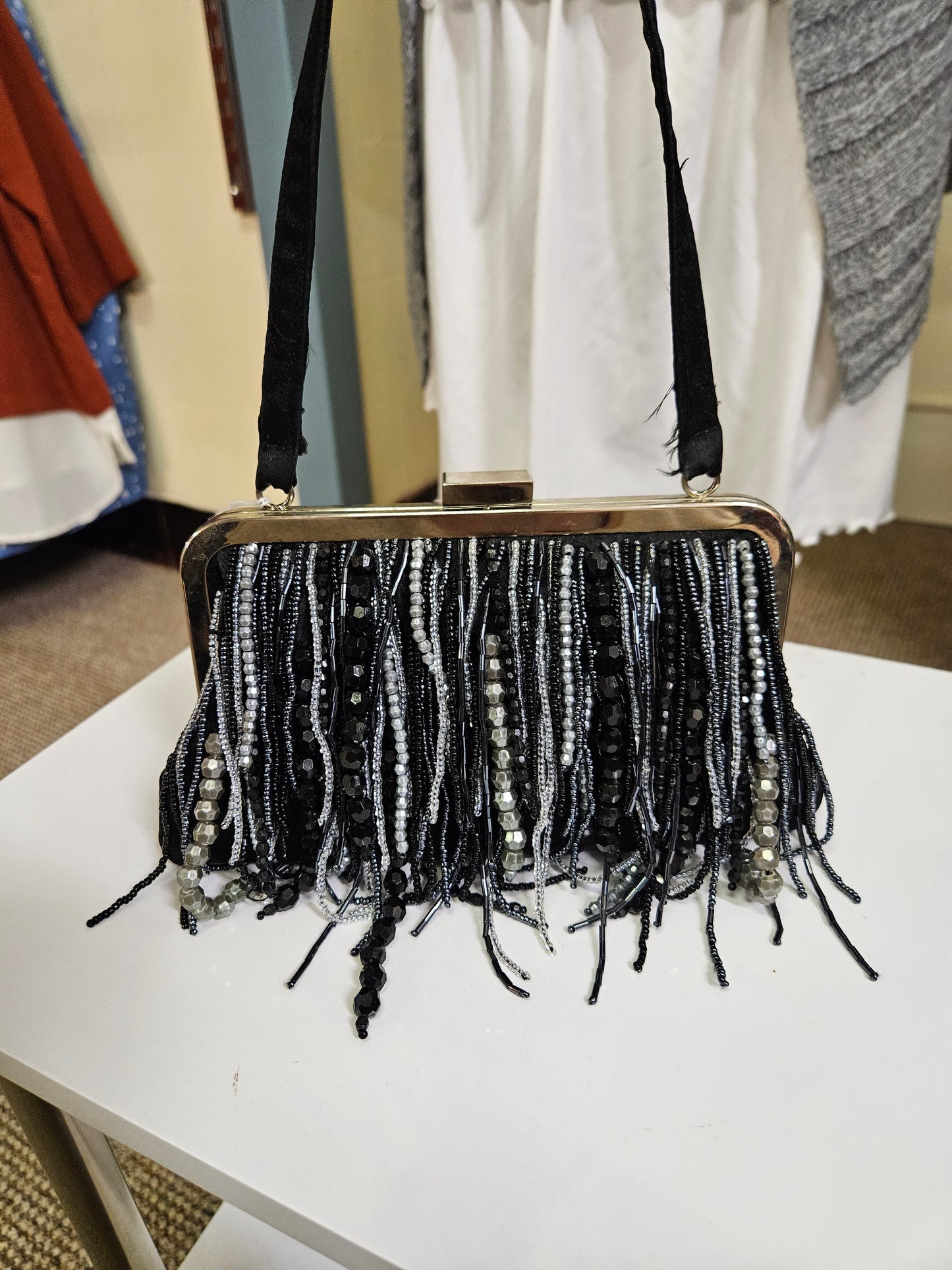 Mini clutch bag with fringe/beads