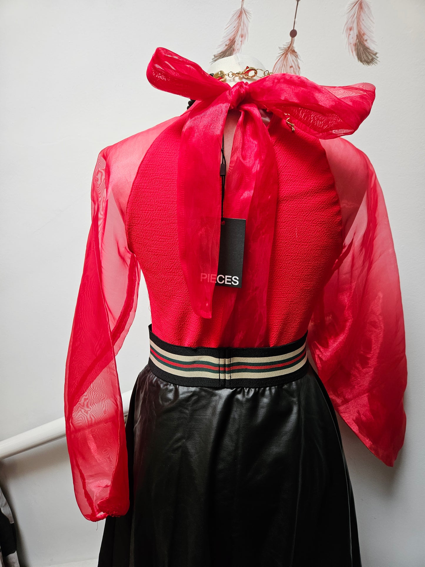 Pieces, new red top with bow at the back, size S