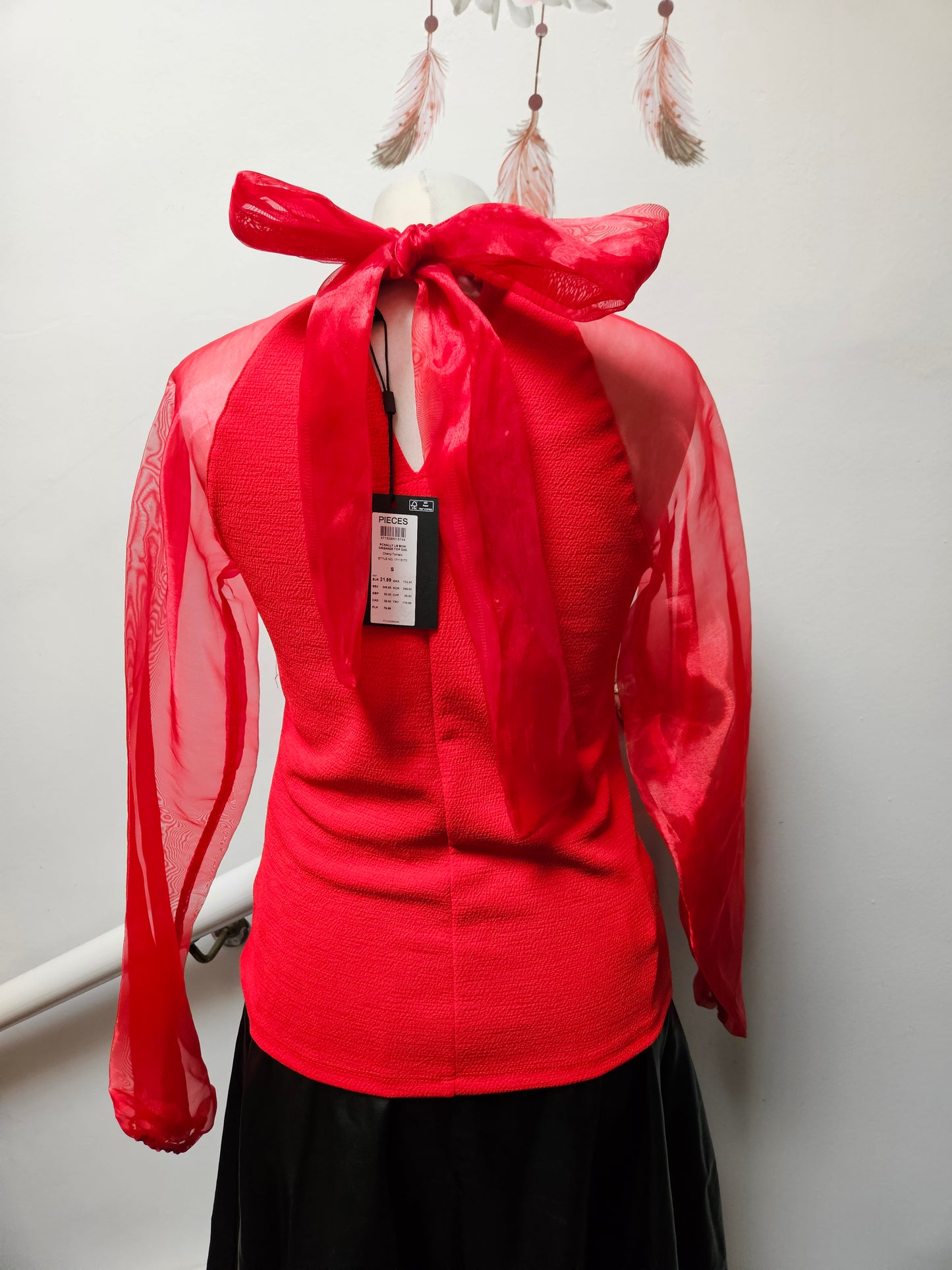 Pieces, new red top with bow at the back, size S