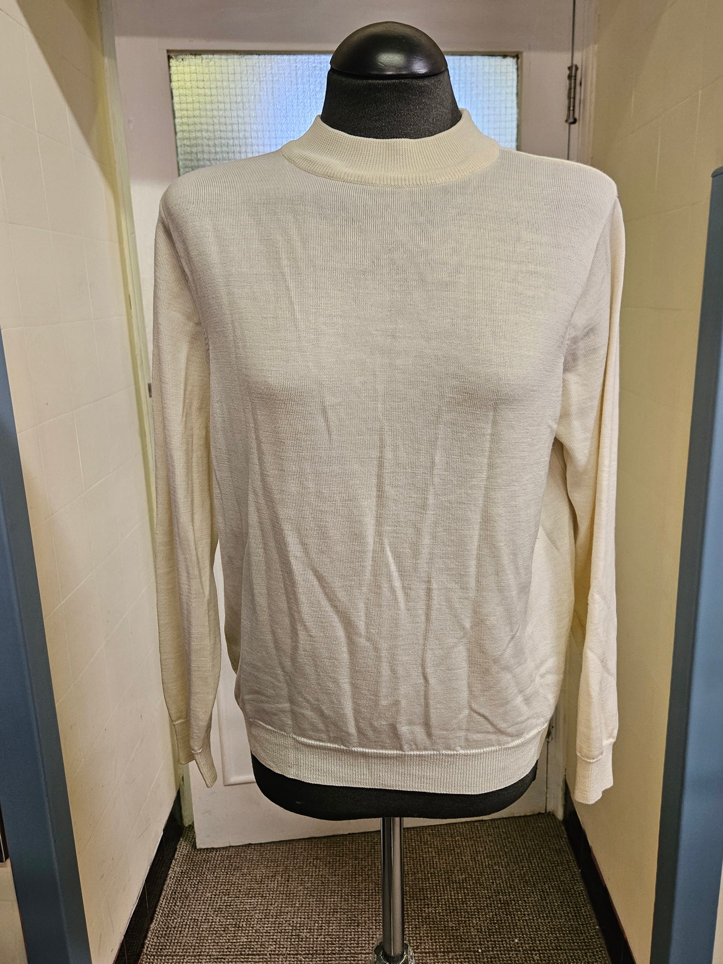 Castle,ivory,wool turtleneck, size 16(small fitting)