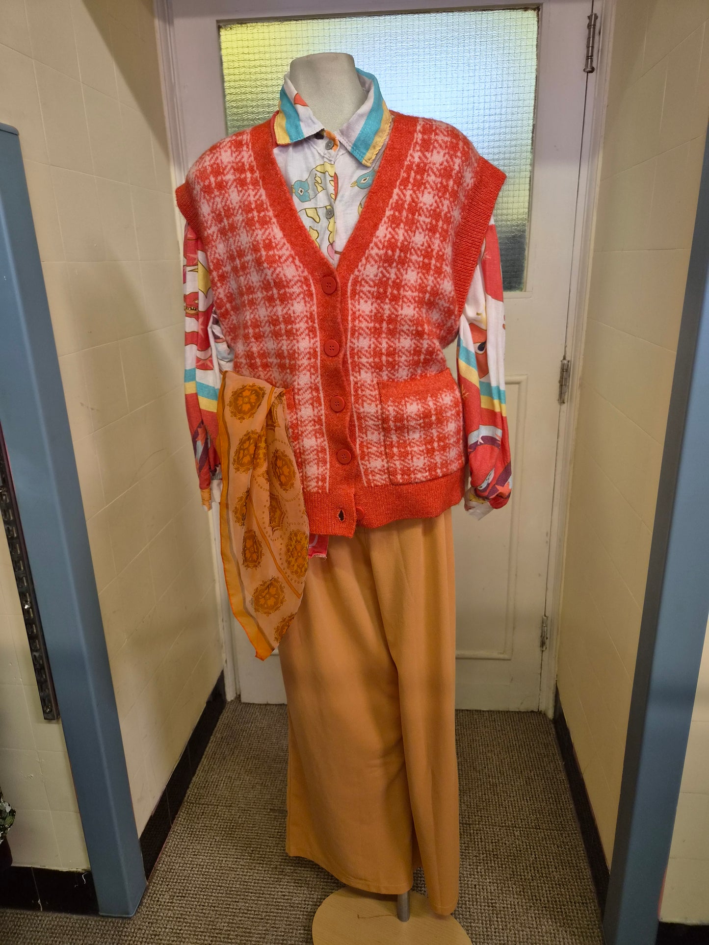 Primark, orange and white houndstooth button-up sweater vest, size S