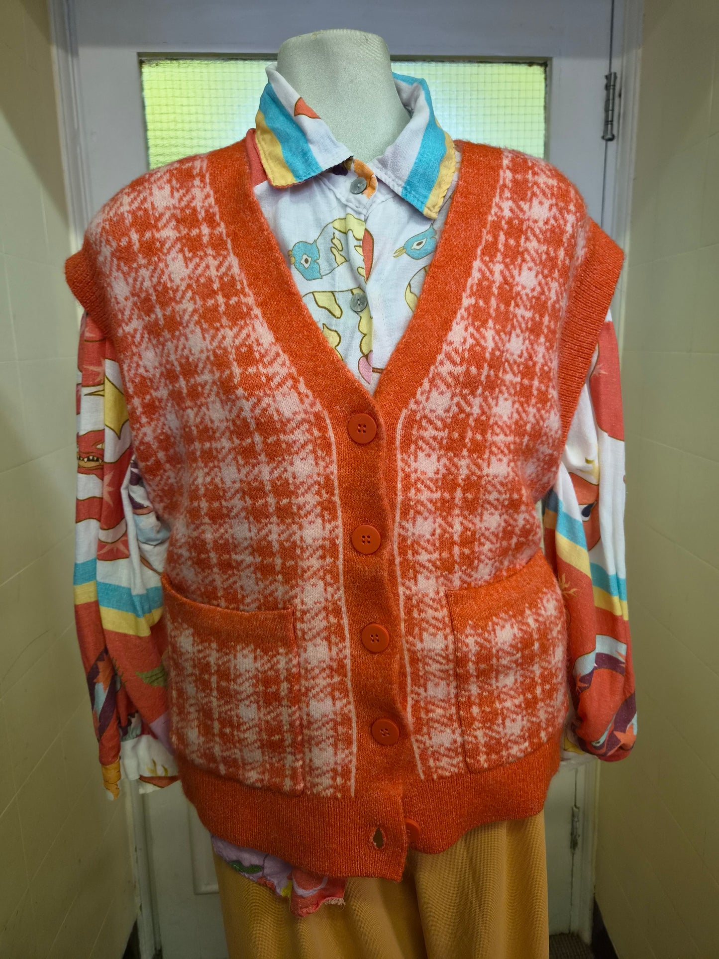 Primark, orange and white houndstooth button-up sweater vest, size S