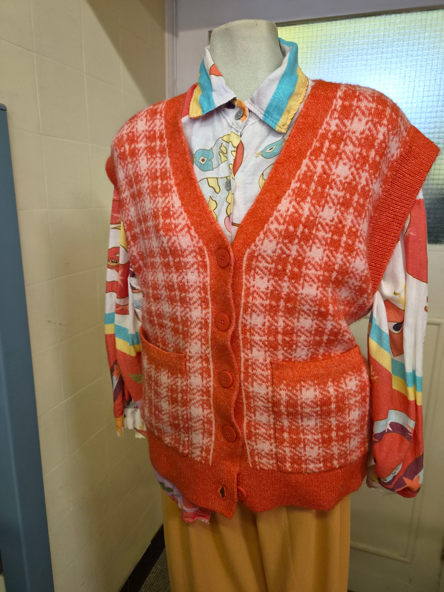 Primark, orange and white houndstooth button-up sweater vest, size S