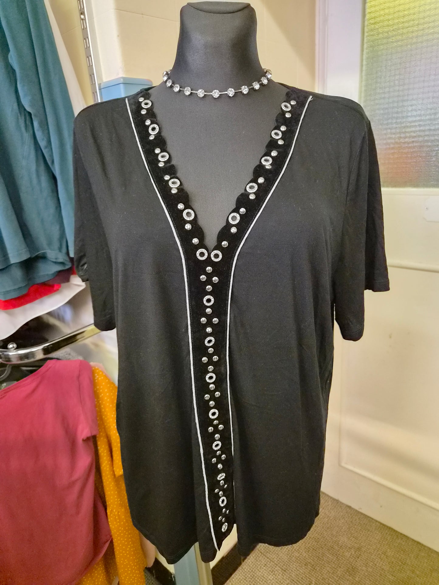 River Island black top, decorative detail in the middle, size 14